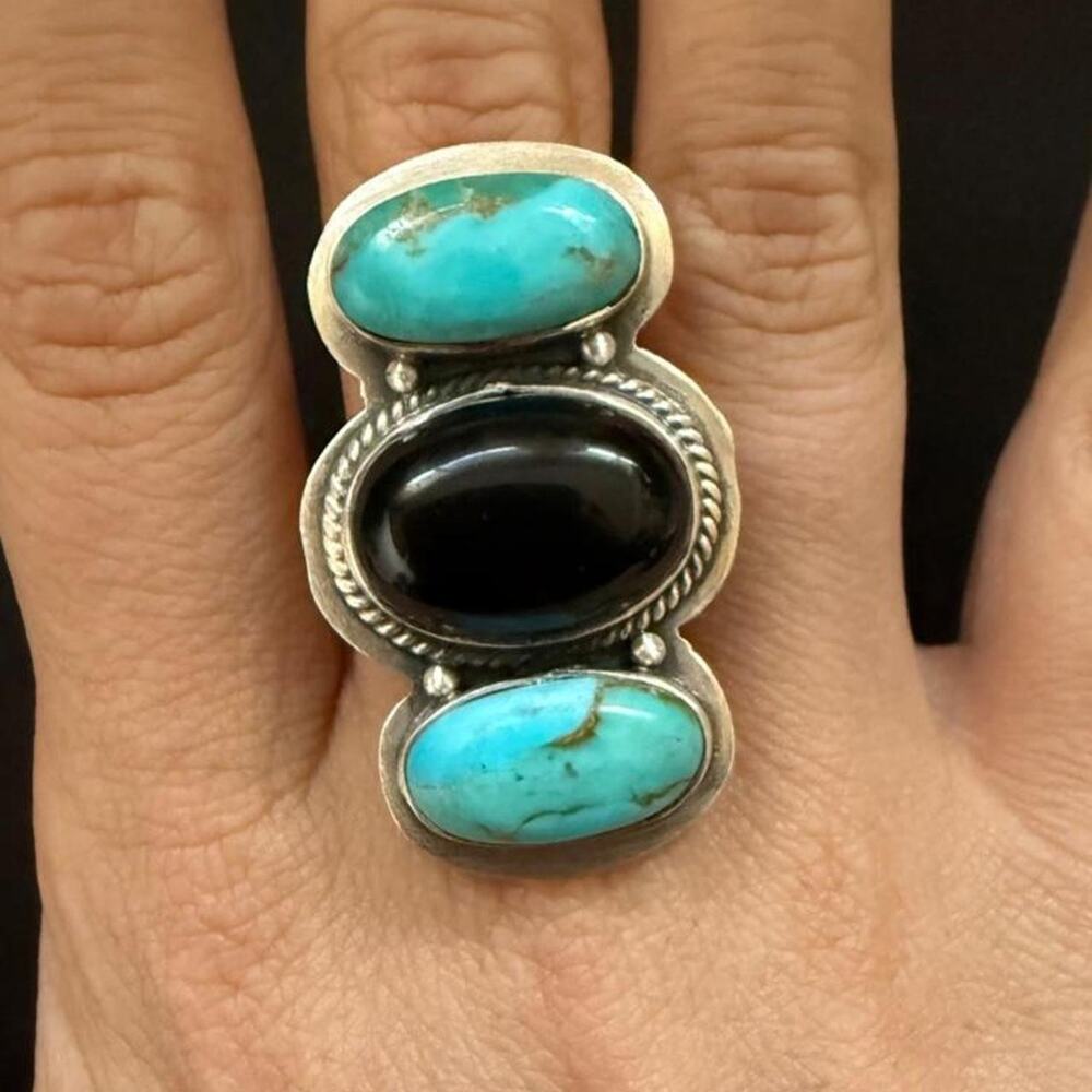 Big thick sterling silver kingman and black onyx triple stone ring. Adjustable